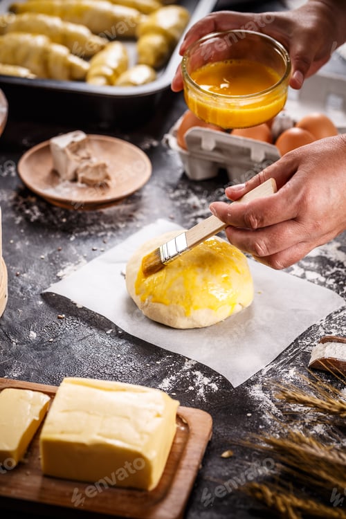 Preview: Baker putting whisked egg