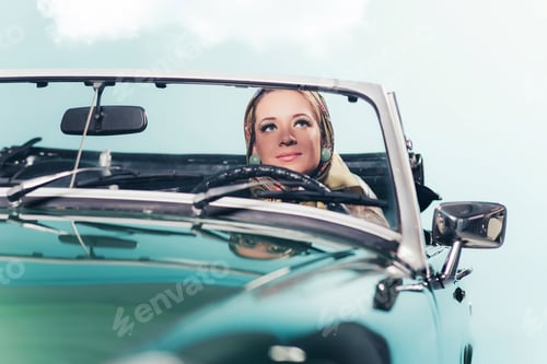 Preview: Classic 1960S Fashion Woman With Headscarf Driving Sports Car.