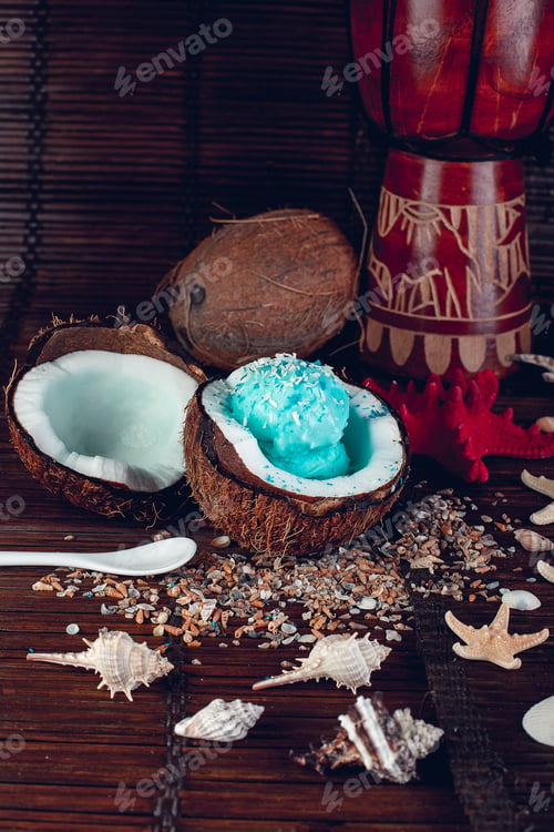 Preview: Blue ice cream in coconut bowl. Summer vacation