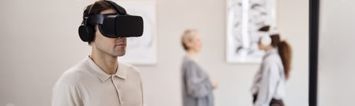 Preview: Caucasian Young Adult Man Experiencing Virtual Reality Indoors