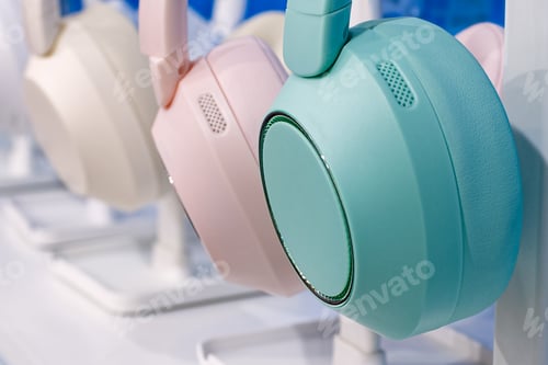 Preview: Group of modern multi-coloured wireless headphones.