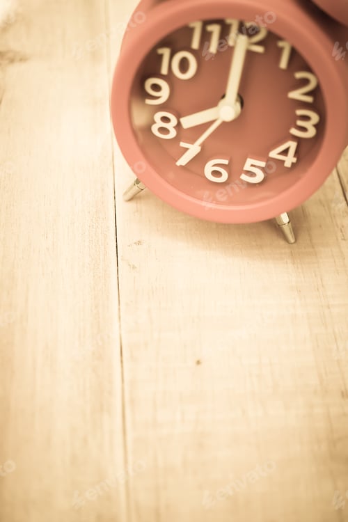 Preview: Alarm Clock On Wood Table In Vintage Color Style