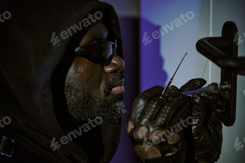 Preview: African American Man Holding Lockpick