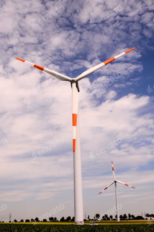 Preview: Windmill Turbine Renewable Green Energy Source against cloudy sky
