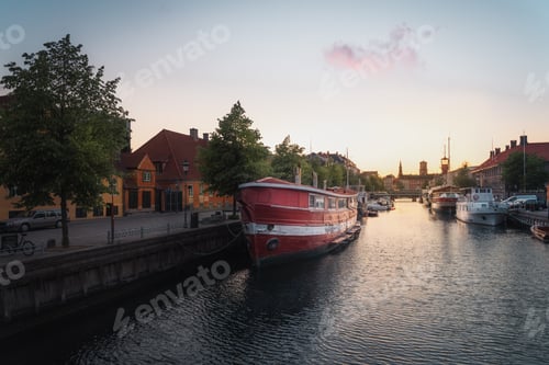 Preview: Christians Brygge canal and boats at sunset - Copenhagen, Denmark