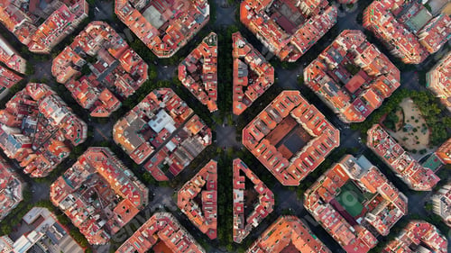 Preview: Barcelona city skyline, aerial view. Eixample residential district at sunrise. Catalonia, Spain