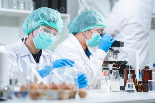 Preview: researcher working in laboratory for medicals science research using scientific equipment technology