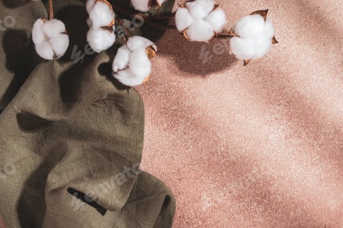 Preview: Serving napkin and a branch of cotton on a beige background