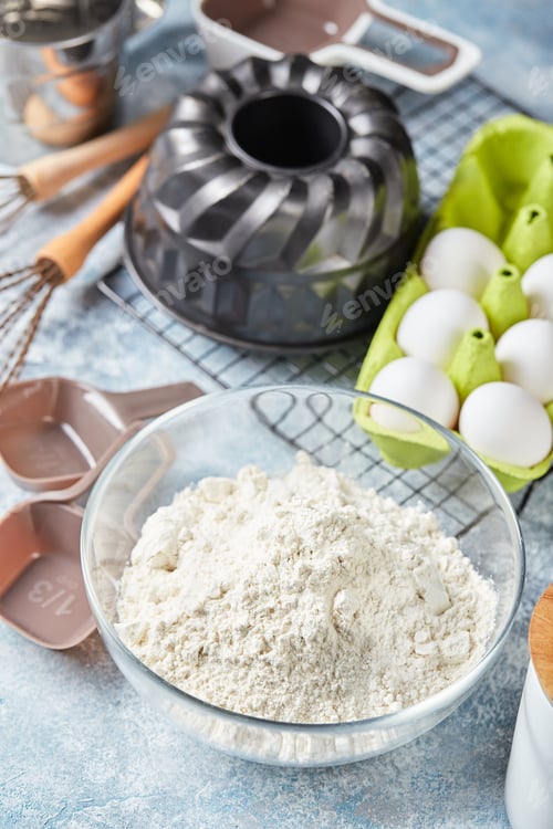 Preview: Baking ingredients and utensils, flour, eggs, baking dish.