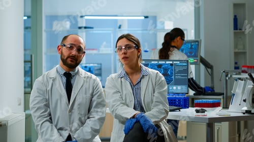 Preview: Team of researchers looking at virtual display with touchscreen