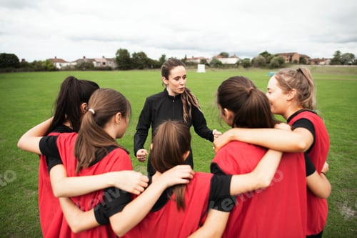 Preview: Rugby players and their coach gathering before a match