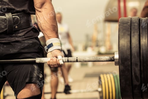 Preview: Closeup Portrait Of Professional Bodybuilder Workout With Barbell Outdoors