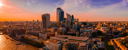 Preview: Breathtaking scenery of sunrise over high skyscrapers and modern buildings in London, UK