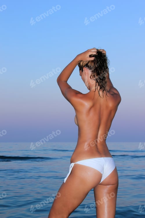 Preview: woman topless in water