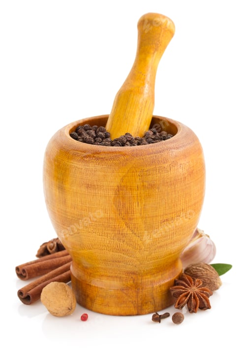 Preview: mortar with pestle and spices on white