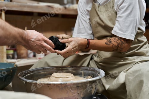 Preview: A skilled artisan creates unique pottery using traditional techniques in a cozy workshop setting