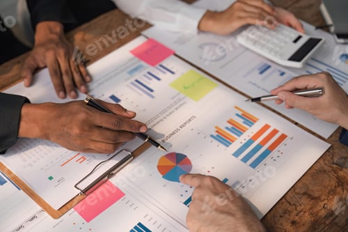Preview: Business team working at office with documents on his desk, doing planning analyzing the financial