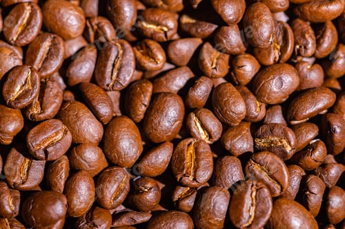 Preview: abstract texture background of roasted coffee bean closeup, black brown seed ingredient