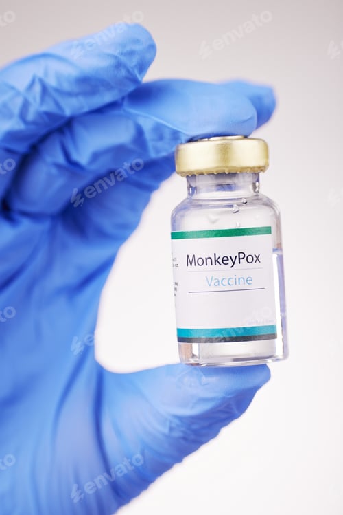 Preview: Health, doctor and vaccine in hand, bottle with closeup and safety from monkey pox on white backgro
