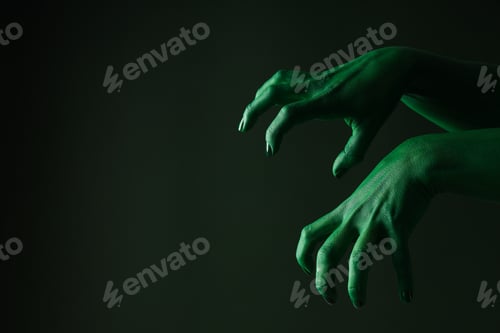 Preview: Green female hands on green background, space for text