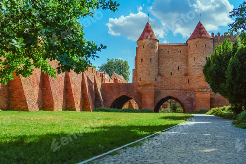 Preview: Warsaw, Poland, Fortress with a Fortified Wall, Towers, and a Gate Leading Across a River