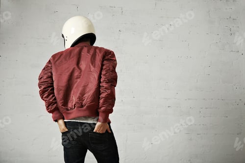 Preview: Stylish Young Adult With Helmet in Urban Setting