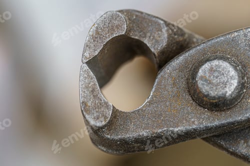 Preview: a closeup of a pliers in very old condition