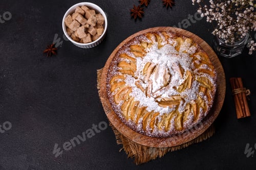 Preview: Apple pie with fresh fruits on a wooden table
