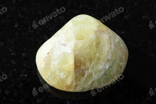 Preview: sample of polished saamite mineral on black