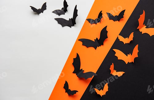 Preview: halloween concept - black and orange paper bats