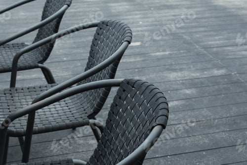 Preview: Black chairs in a outdoor cafe