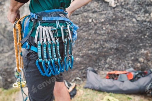 Preview: Close-up of climber with climbing equipment