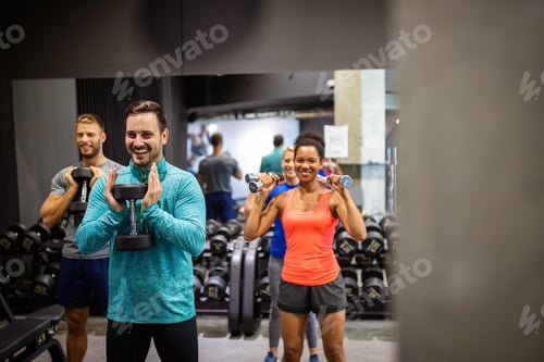 Preview: Fitness, sport, training, gym, success and lifestyle concept. Group of happy friends in the gym