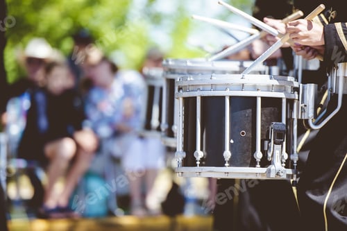 Preview: Closeup shot of drummers with black drums and a blurred background