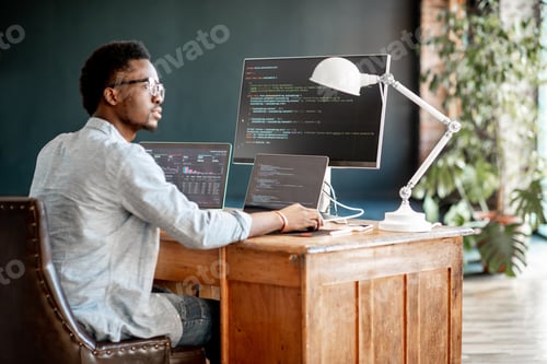Preview: Programmer working with program code