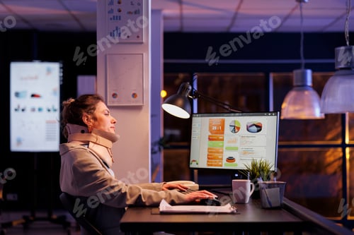 Preview: Injured entrepreneur working overtime at marketing project