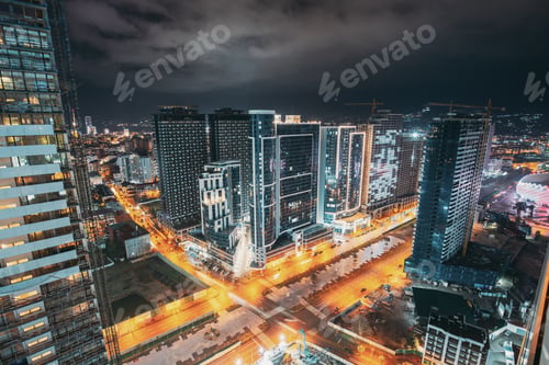 Preview: View of hotel Address Dubai Marina, Dubai mall and Burj Khalifa against blue and white sky. View of