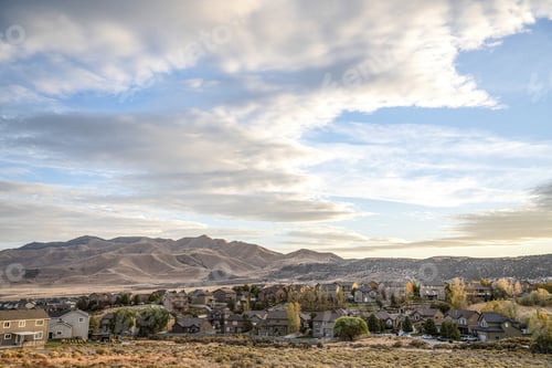 Preview: Small inhabited village with modern buildings located on mountainous land
