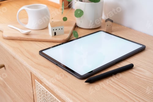 Preview: Blank tablet mockup on table.