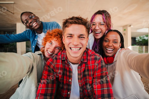 Preview: A cheerful group of diverse teenage students taking a selfie together, smiling brightly at the
