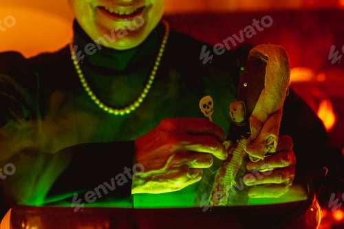 Preview: detail of hands of elderly person performing witchcraft