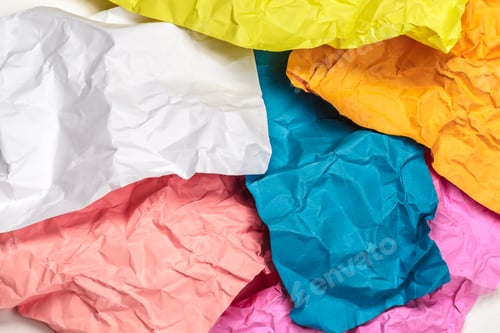 Preview: close up of a crumpled paper with curled edge on white background