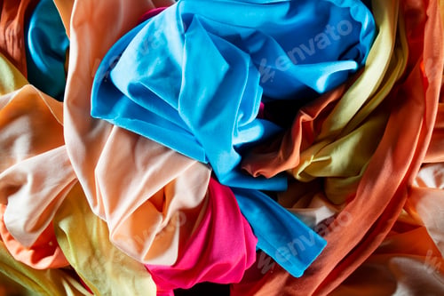 Preview: A group of multicolored cloth drapes