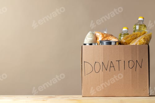 Preview: Donation box with various food. Pandemic support