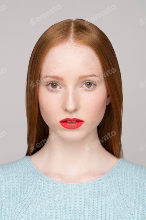 Preview: Portrait of a youthful redhead with striking features