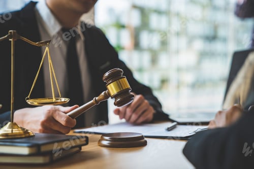 Preview: Lawyer or judge holding Hammer prepares to judge the case with justice, and litigation, scales of ju