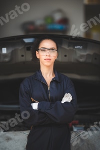 Preview: professional African American mechanic woman portrait, auto car repair and service workshop