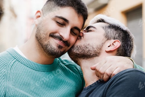 Preview: Gay male couple having romantic moment together. Lgbtq love, pride month concept