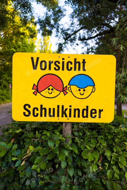 Preview: German caution school children sign in the park