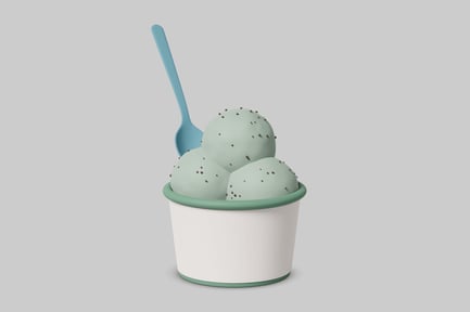 Preview: A cup of mint ice cream with a spoon